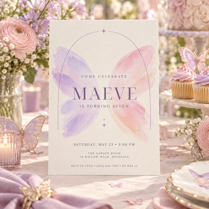 Minimal butterfly birthday invitation on a party table with cupcakes