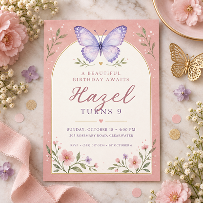 Butterfly arch invitation on a flat lay with pink ribbon and blossoms