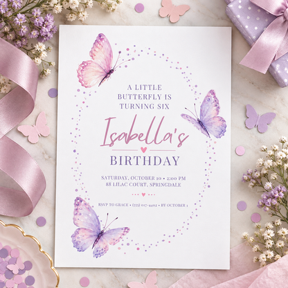 Little butterfly invitation on cream with pink ribbon, confetti and a gift box