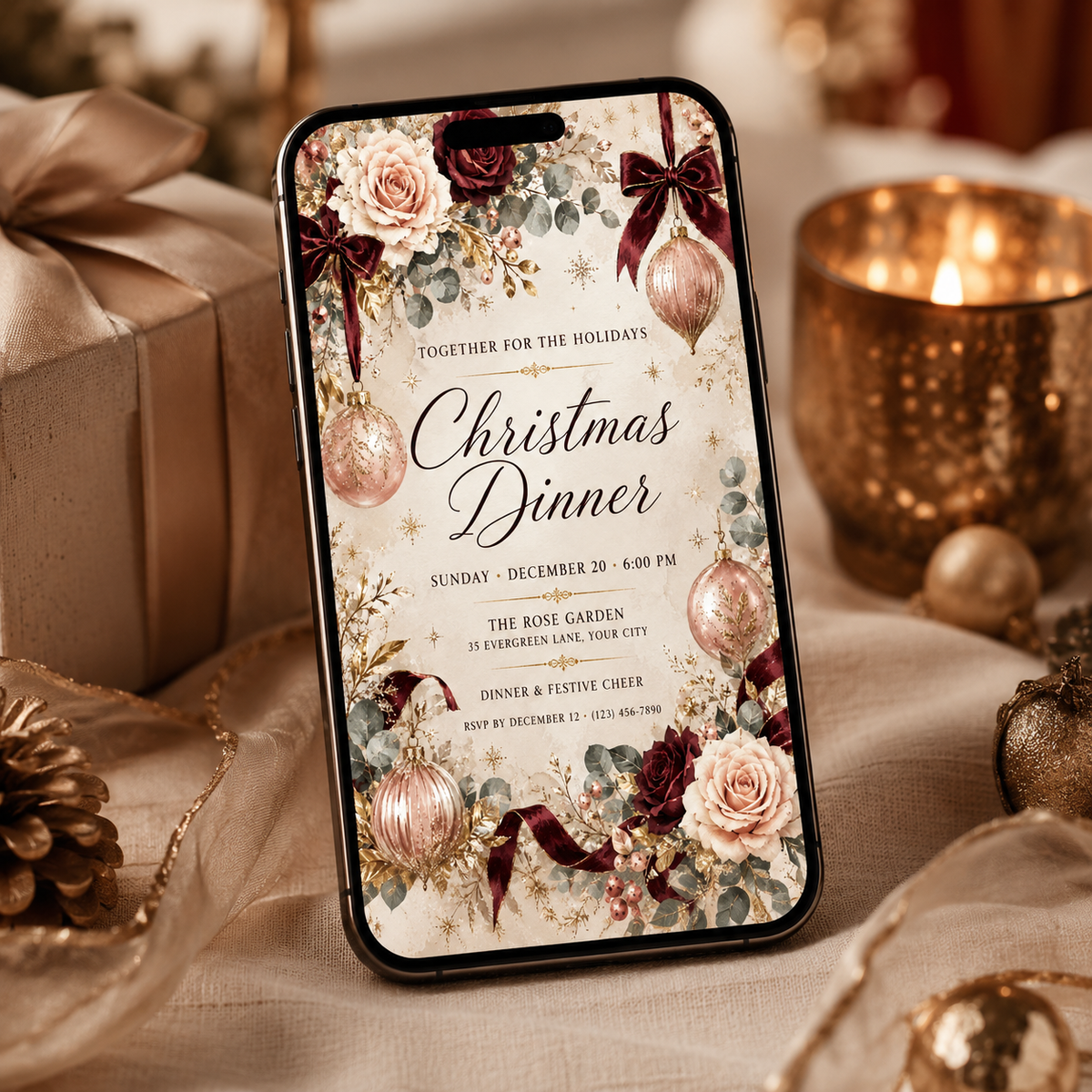 Blush Christmas dinner invitation shown on a phone